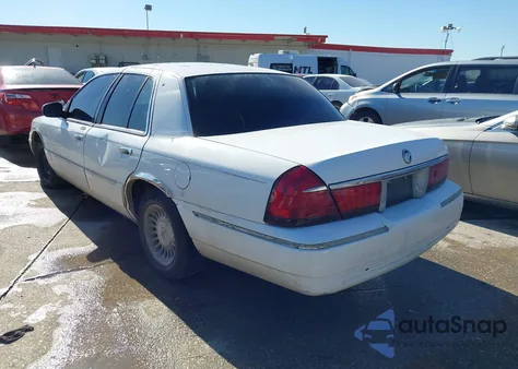 2000 Mercury Grand Marquis Ls из США, поврежденный, VIN 2MEFM75W3YX733434